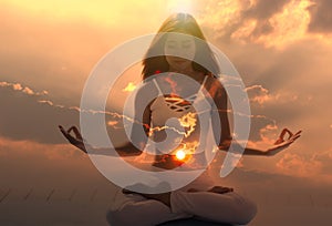 Young spiritual meditation with aura woman feeling free on nature energy at sunrise