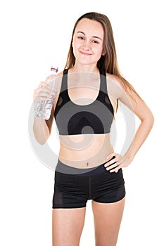 Young sport athletic woman wearing black clothes holding water bottle in gym