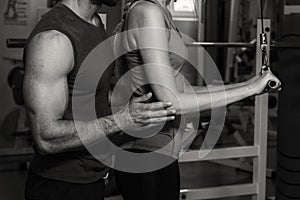 Young sport couple in the gym