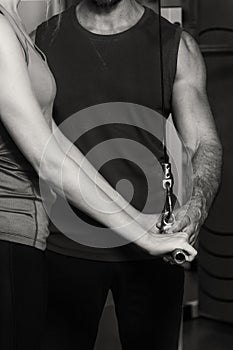 Young sport couple in the gym