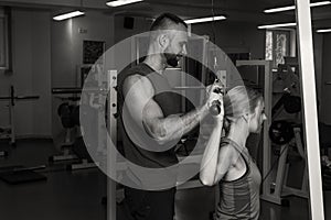 Young sport couple in the gym