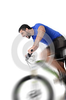 Young sport man riding mountain bike training sprint in fitness and competition concept