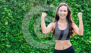 Young sport woman doing morning exercise in park.