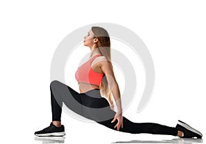 Young sport woman gymnastics doing stretching fitness exercise workout isolated on a white