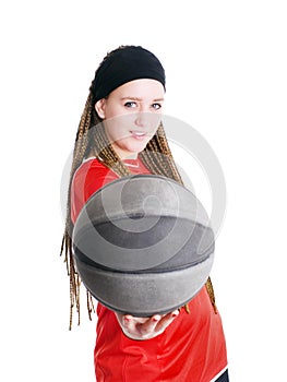 Young sport woman holding ball over white