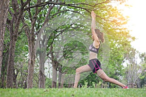 Young sport woman stretching relaxation warm up before exercise.