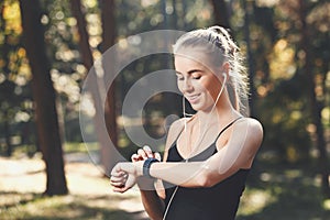 Young Sportish Woman With The Sports Watch