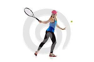 Young sportive woman, tennis player playing tennis isolated on white background. Healthy lifestyle, fitness, sport
