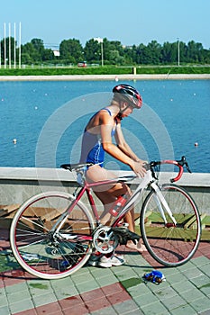 The young sportswoman finish a bicycle stage