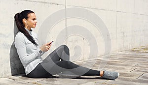 Young and sporty brunette woman training outdoor. Fitness, sport, lifestyle and health care.