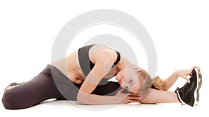 Young sporty girl doing stretching exercise isolated. Healthy lifestyle