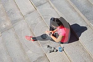 Young and sporty girl with a smartwatch.