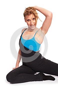 Young sporty woman in the warm-up workout