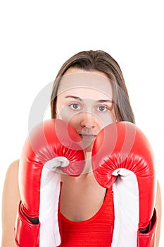 Young sporty woman wearing boxing gloves red in white background