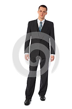 Young standing businessman full body