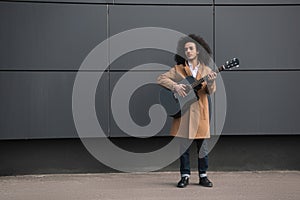 young street musician playing