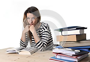 Young stressed student girl studying and preparing MBA test exam in stress tired and overwhelmed