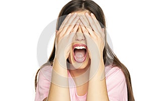 Young stressed woman screaming