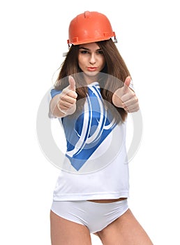 Young strong beautiful woman showing thumbs up smiling laughing
