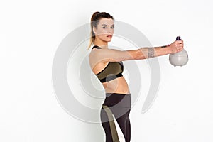 Young strong girl exercising with kettle bell - Image