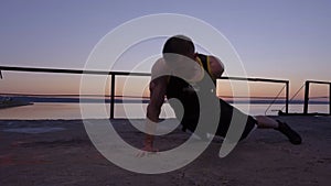 Young Strong Man Doing Push-ups On One Hand While Training