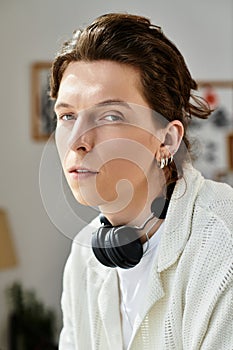 Young man studies at home while