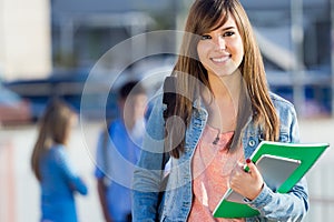 Young student girl looking at the camera