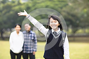 young student girl with parent in school