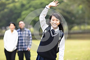 young student girl with parent in school