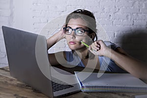 young student girl studying tired at home laptop computer prepar