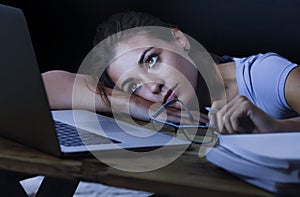 young student girl studying tired at home laptop computer prepar