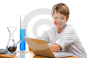 Young student with laboratory equipment.