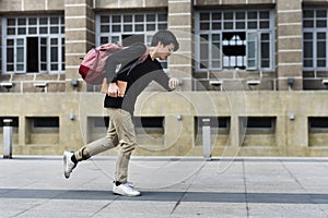 Young student late for school