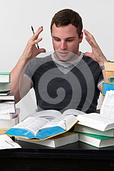 Young Student overwhelmed with studying