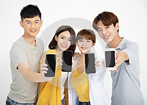 young student people showing smartphones