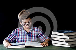 Young student reading a book