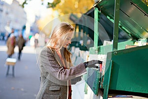 Young student selecting a book