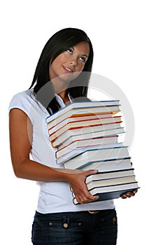 Young student with a stack of books