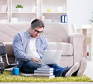 Young student studying at home