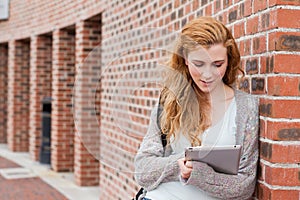 Young student using a tablet computer