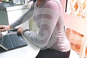 Young student women is using tablet computer