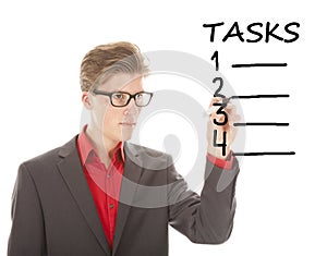 Young student writing tasks items isolated