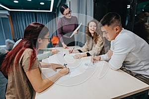 Young students collaborating on a group project in a modern classroom