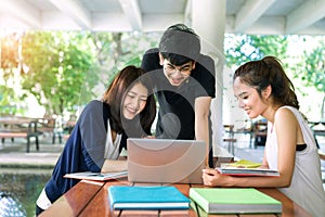 Young Students Group Consult with School Folders