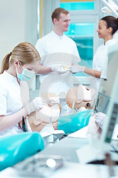 Young students on internship in office