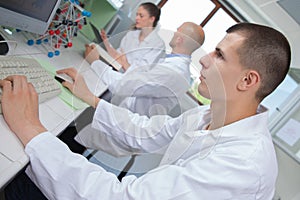 Young students researchers in laboratory