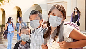 Young Students on School Campus Wearing Medical Face Masks