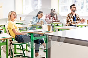 young students sitting in classroom