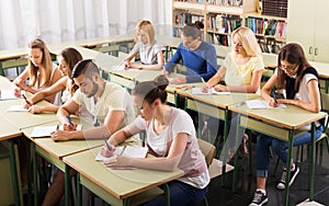 Young students studying in the classroom