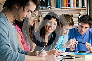 Young students studying in a library